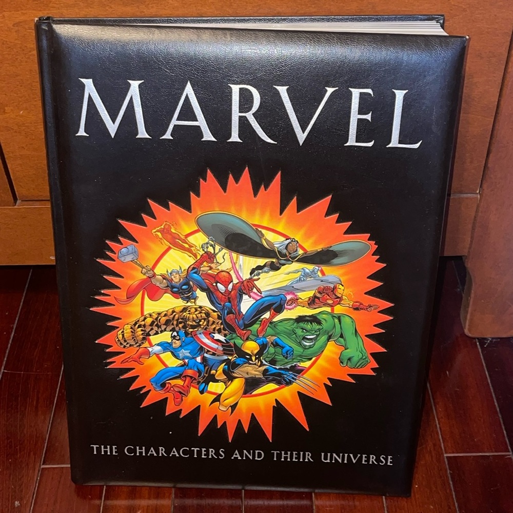 Preowned Marvel: The Characters and Their Universe Hardcover Leather Book